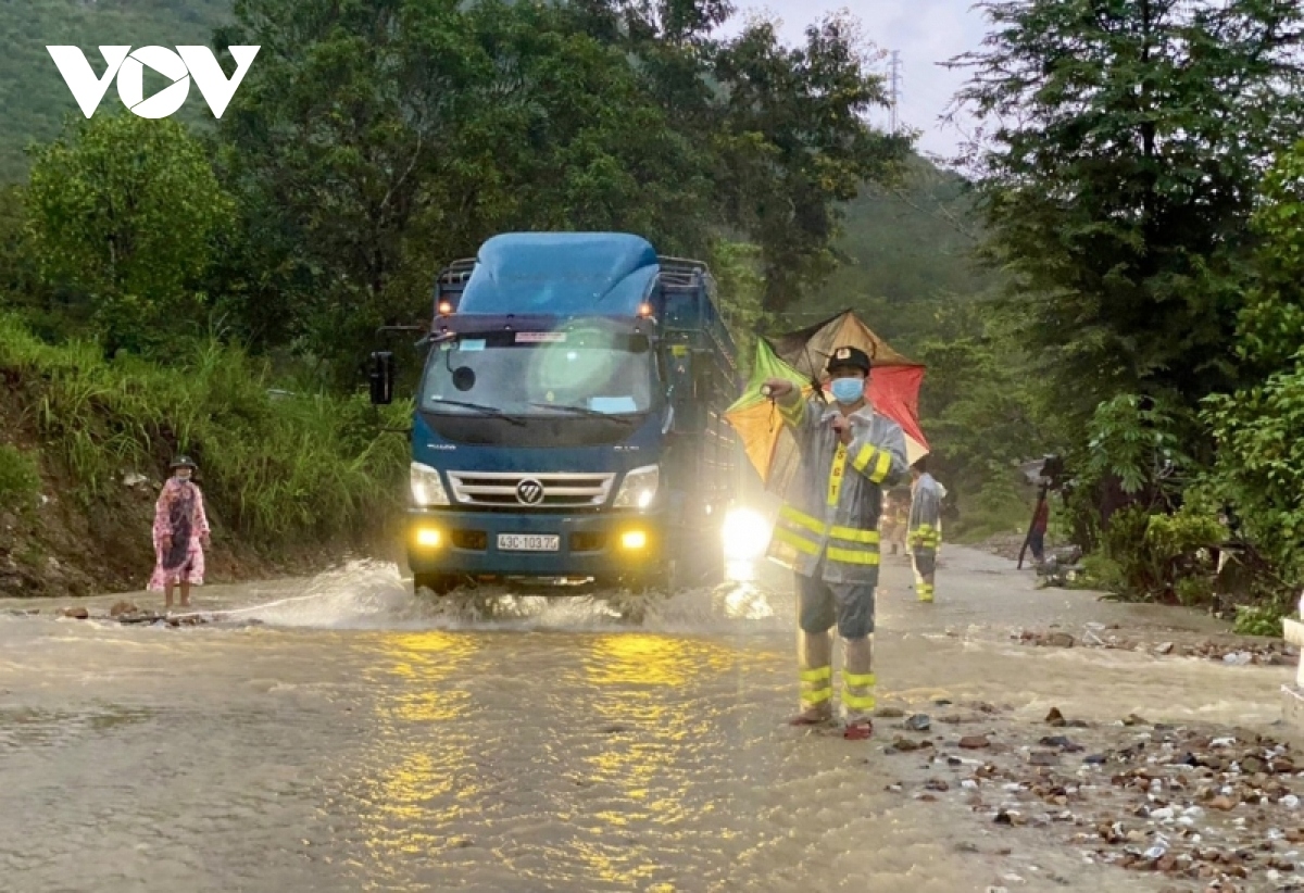 A traffic policeman provides guidance for vehicles as they travel on local roads.