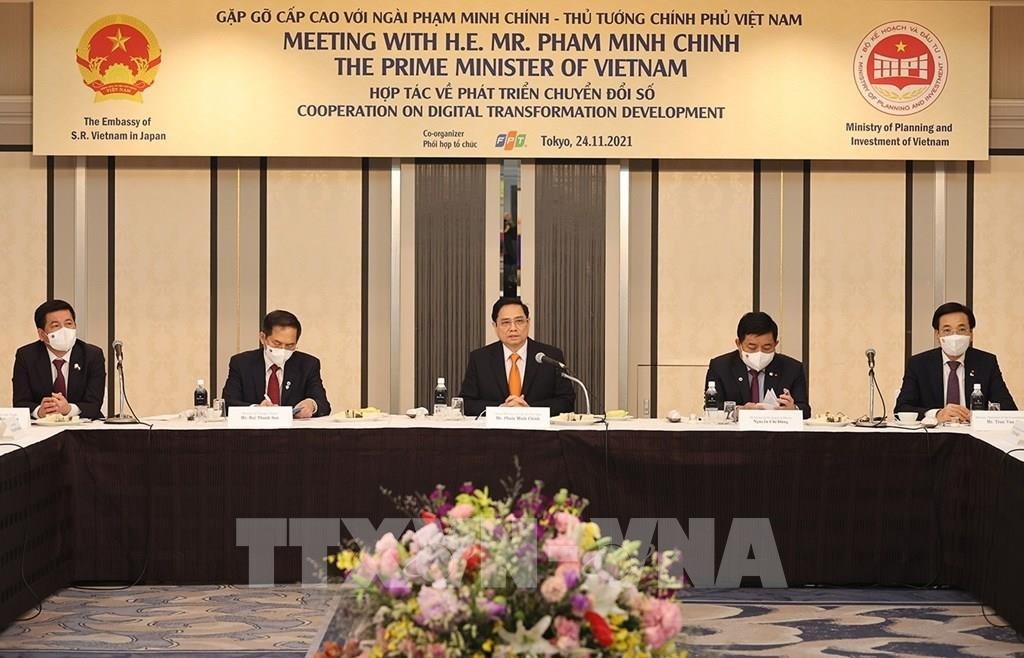 Prime Minister Pham Minh Chinh holds a working session with leaders of major digital transformation groups of Japan (Photo:VNA)