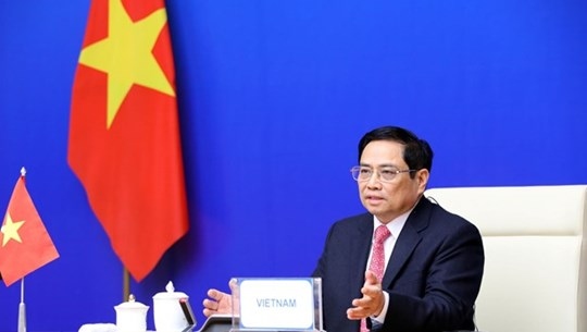 Prime Minister Pham Minh Chinh speaks at the virtual 13th ASEM Summit on November 26. (Photo: VNA)