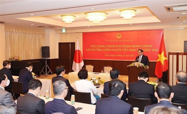 prime minister pham minh chinh meets vietnamese community in japan picture 1