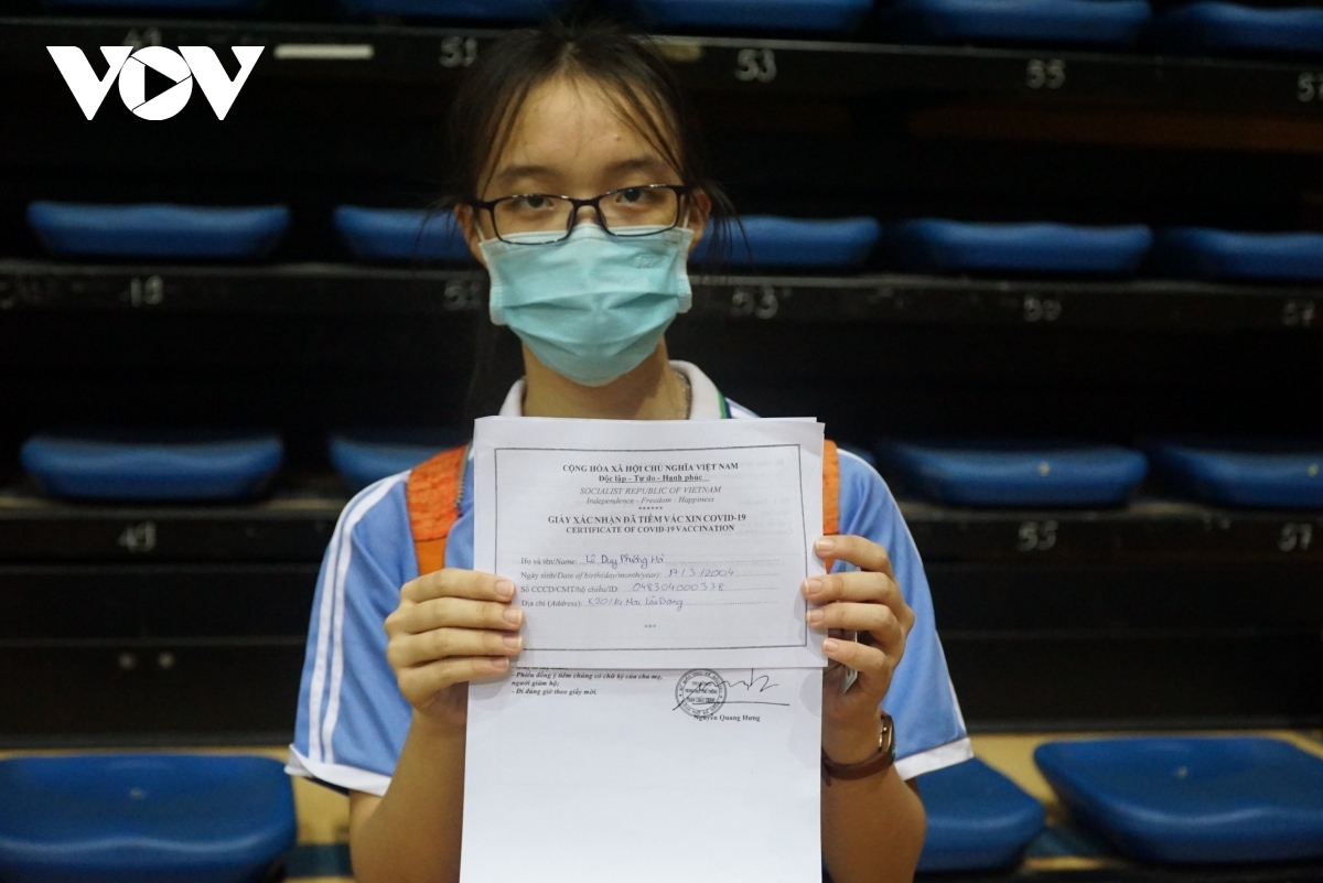 A student is eager to receive a COVID-19 vaccination certificate.