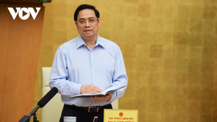 PM Pham Minh Chinh has asked the healthcare sector to be highly vigilant against the emergence of the new variant Omicron in Vietnam.