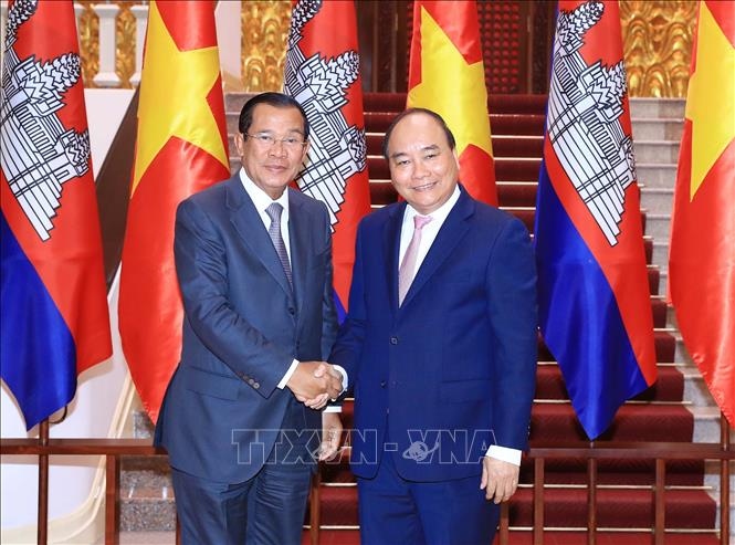 Thủ tướng Nguyễn Xuân Phúc tiếp Thủ tướng Vương quốc Campuchia Samdech Techo Hun Sen nhân dịp sang Việt Nam dự Hội nghị Diễn đàn Kinh tế Thế giới về ASEAN. Ảnh: TTXVN