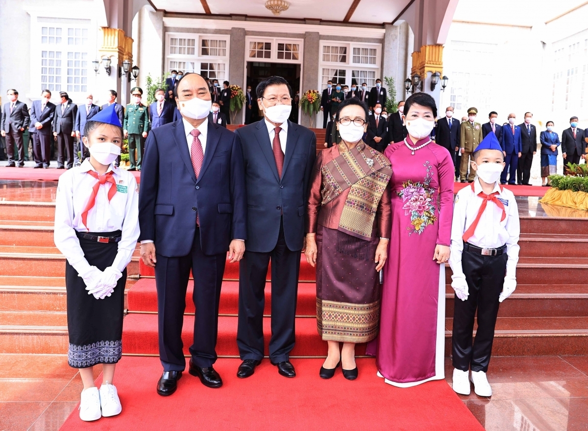 vietnam, laos resolve to maintain sustainable ties amid covid-19 picture 1