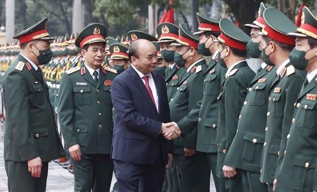 President Nguyen Xuan Phuc meets NDA's leaders, officers.