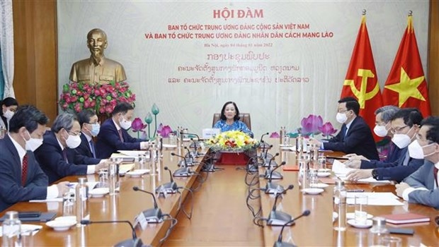 organisation commissions of vietnamese, lao parties foster cooperation picture 1