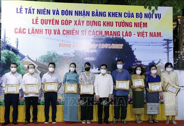 ovs in laos commended for voluntary, charity activities picture 1