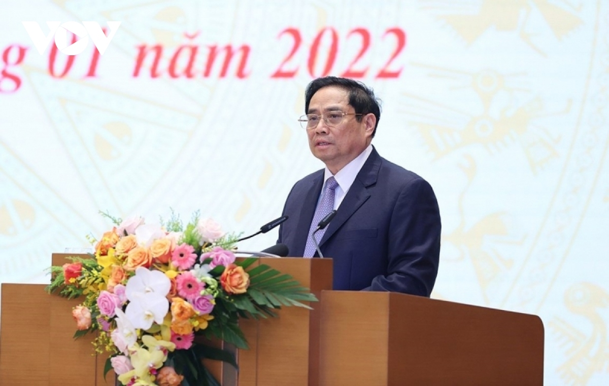 PM Pham Minh Chinh speaks at a meeting with overseas Vietnamese returning to the homeland for the lunar New Year holiday.