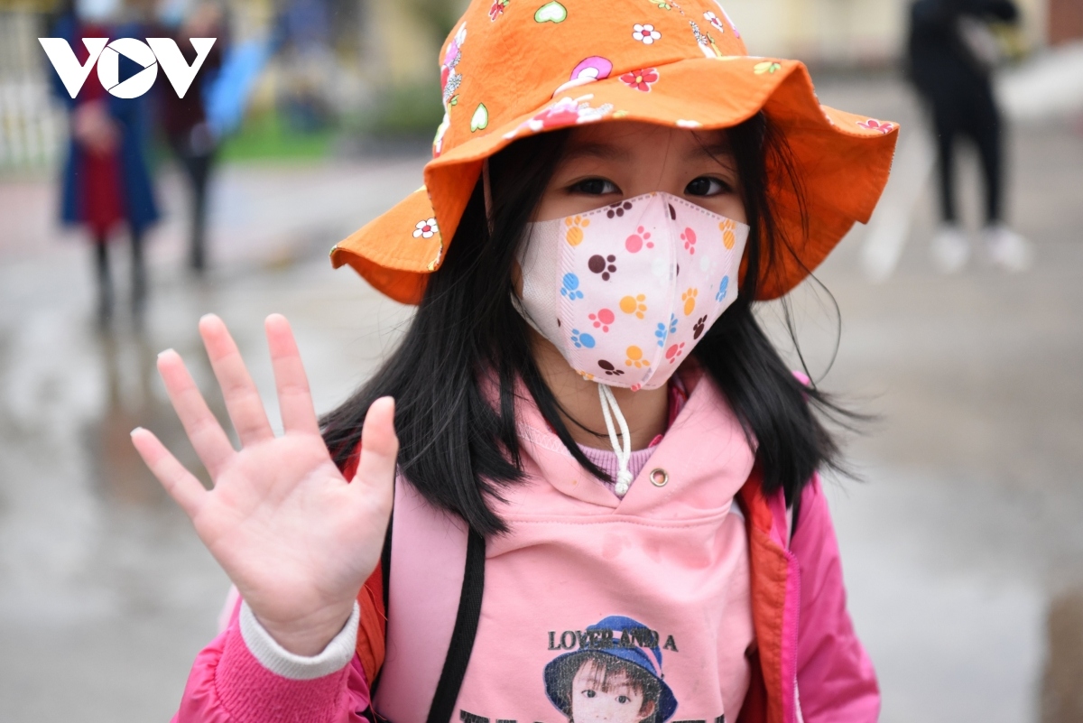 This school girl is happy to return to school to meet her teachers and other classmates.