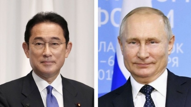 Thủ tướng Nhật Bản (trái) và Tổng thống Nga. Ảnh: Kyodo
