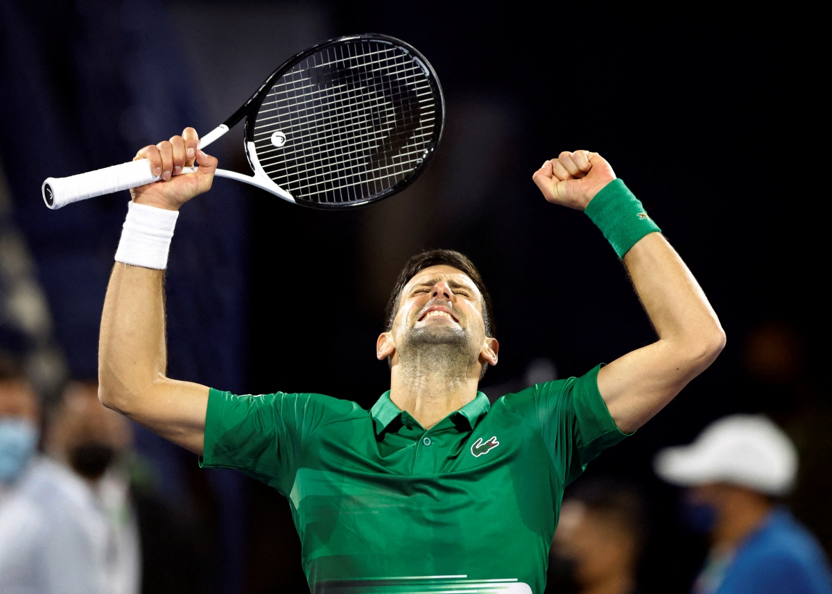 Djokovic ăn mừng chiến thắng. (Ảnh: Reuters).