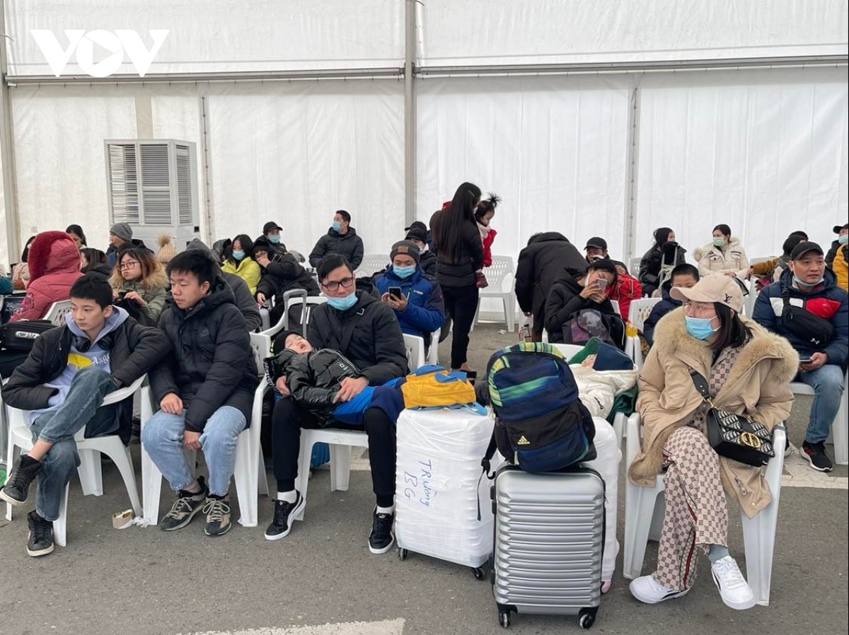 The evacuees wait at concentration areas before making checking-in procedures to board the flight.