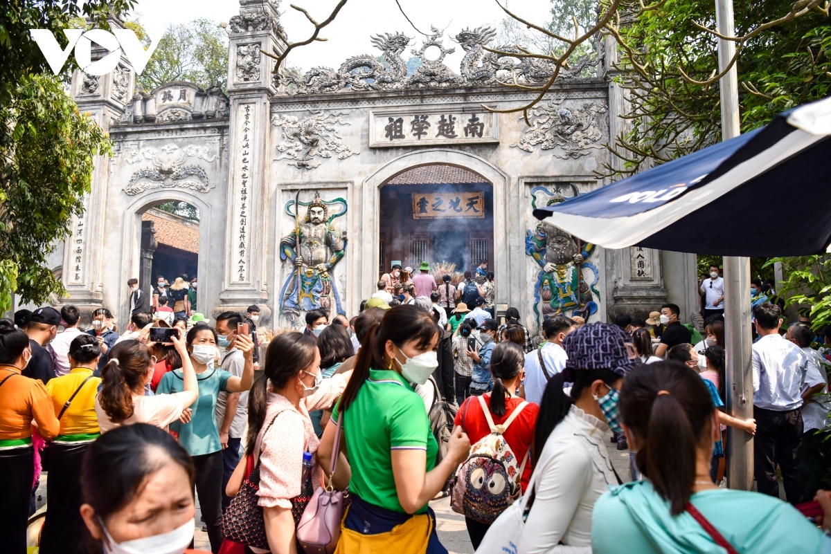 At 10 a.m. Den Thuong (Upper Temple) is packed full of people.