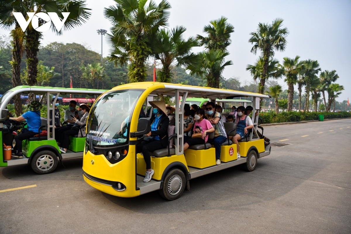 Electric vehicles operate continuously as they transport guests from the parking area.