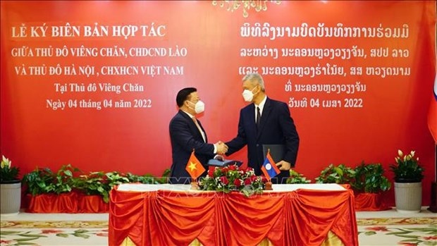 hanoi, vientiane enhance cooperation picture 1