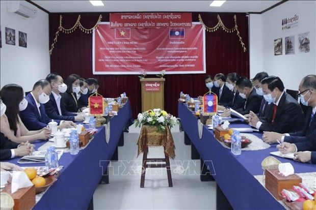 party information-education commission leader busy in laos picture 1