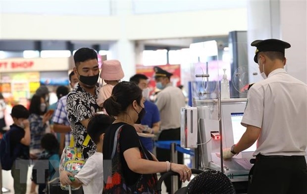 Passengers in Noi Bai International Airport, Hanoi, Vietnam