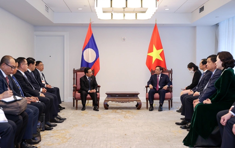 prime minister pham minh chinh meets lao counterpart in us picture 1