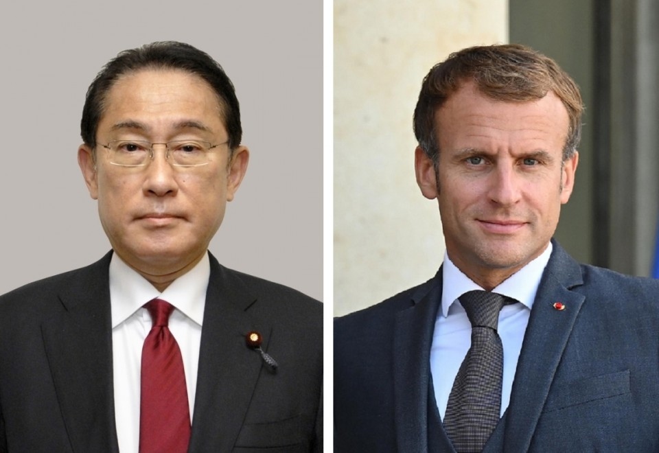 Thủ tướng Nhật Bản Fumio (trái) và Tổng thống Macron. Ảnh: Kyodo