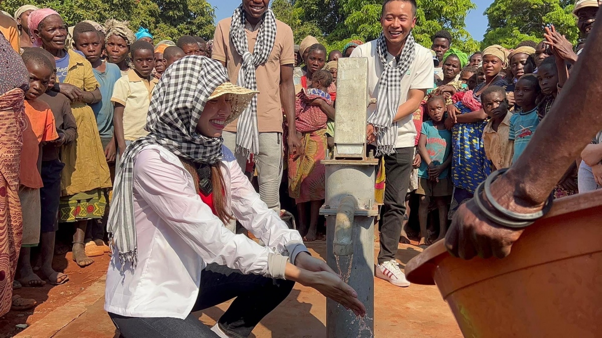 thuy tien helps build clean water wells for locals in angola picture 4