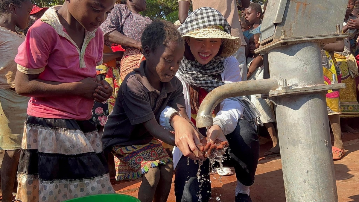 thuy tien helps build clean water wells for locals in angola picture 5