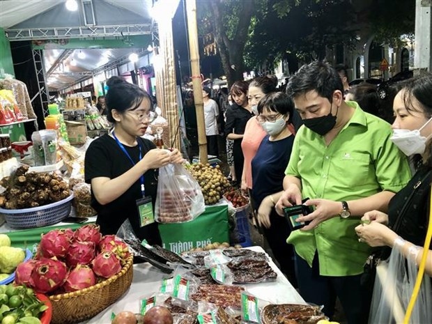 fair treats visitors to hanoi s ocop goods, farm produce picture 1