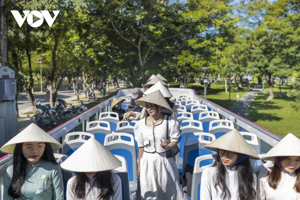 taking a tour of hue on double-decker bus picture 3