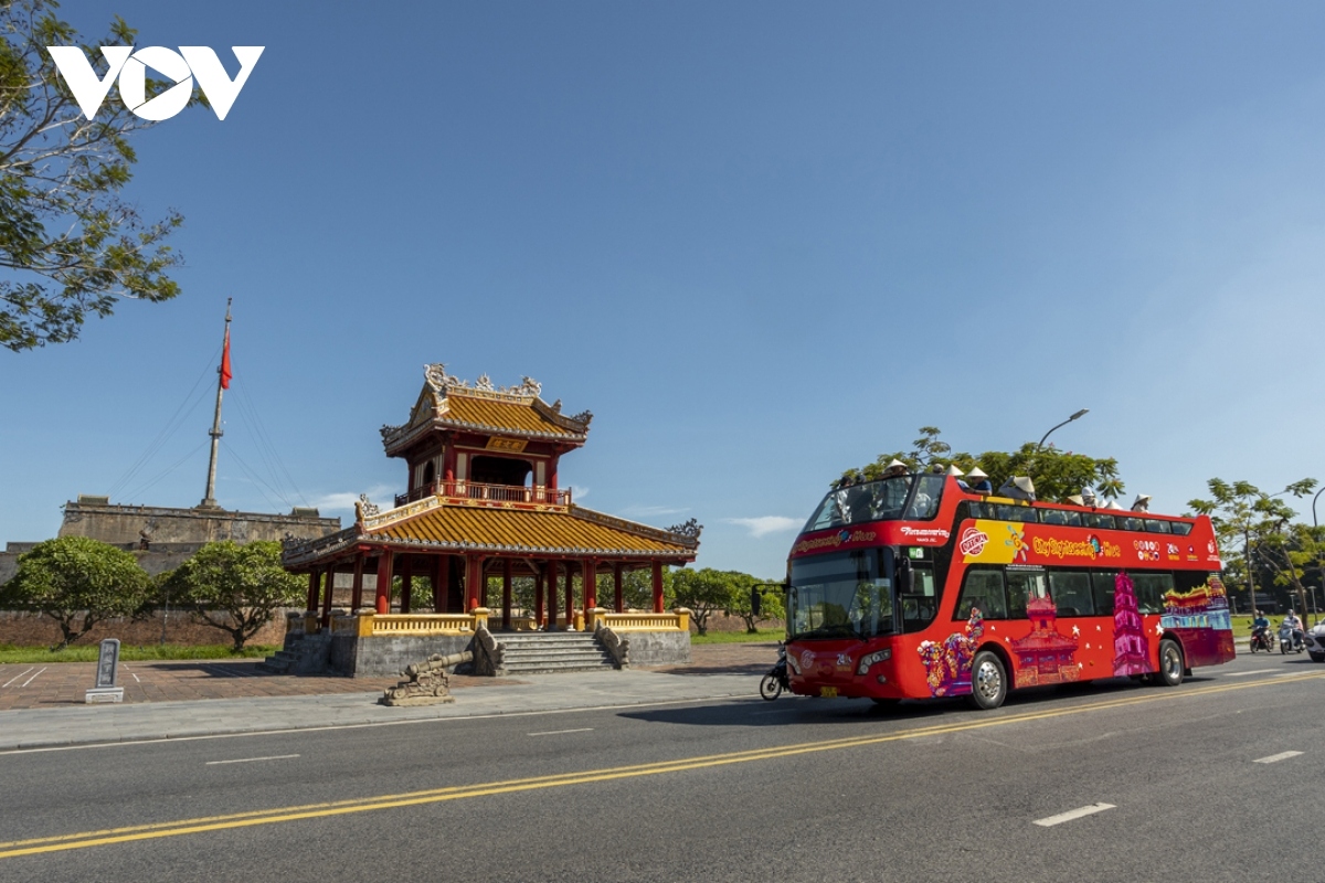 taking a tour of hue on double-decker bus picture 7