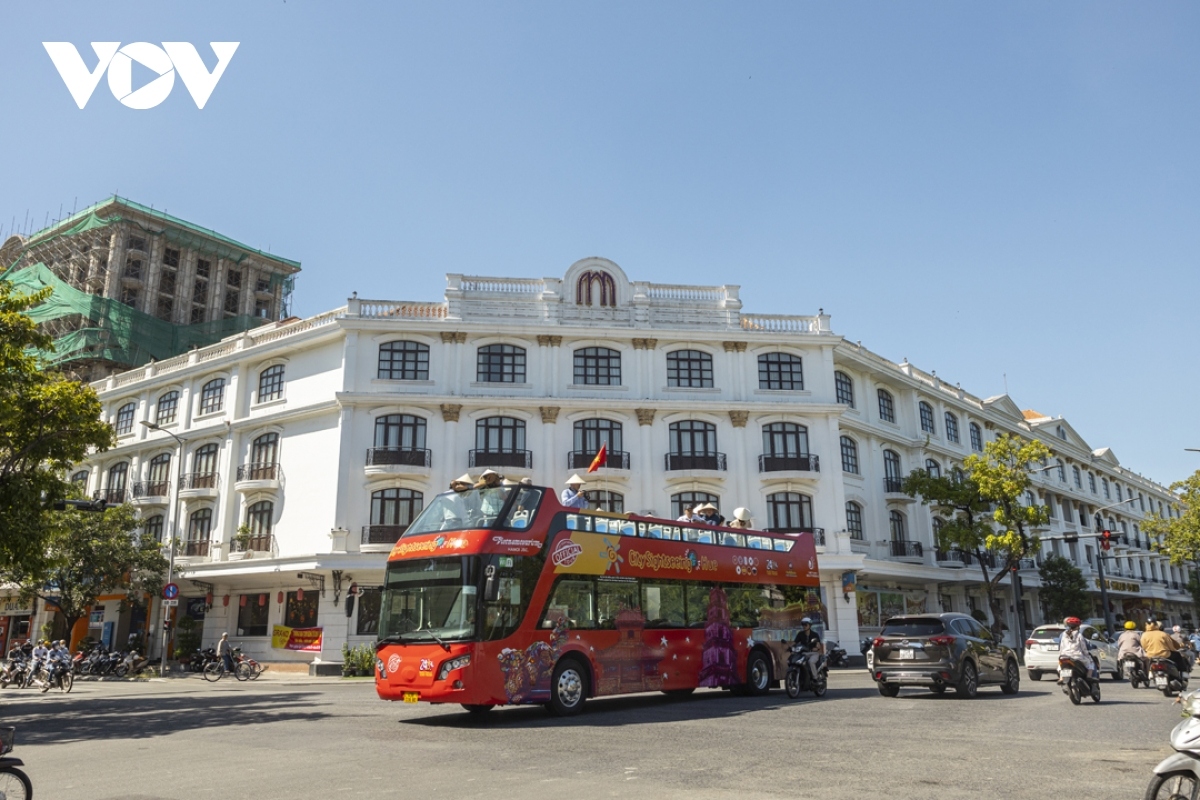 taking a tour of hue on double-decker bus picture 8