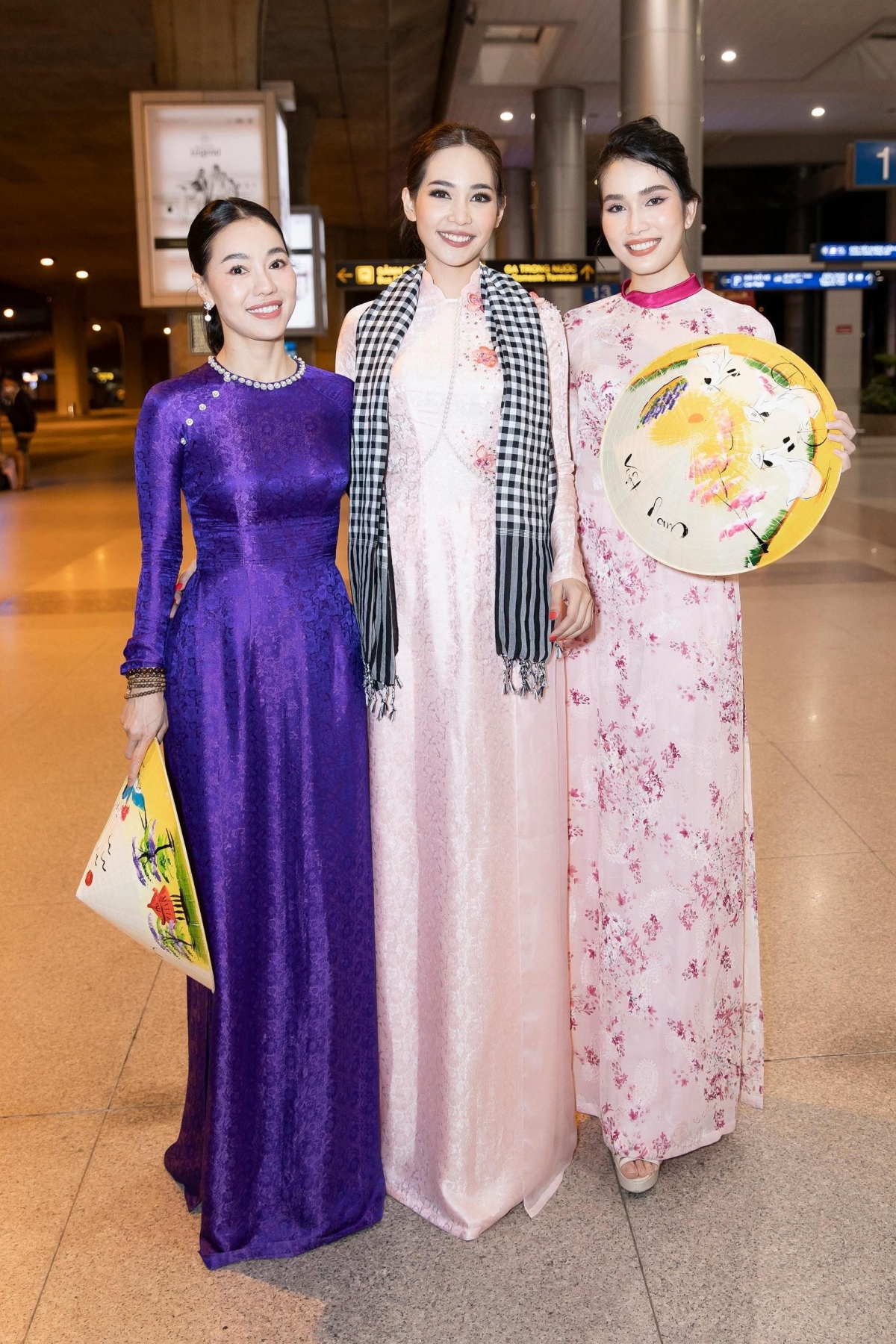 foreign beauties appear charming whilst wearing ao dai picture 5