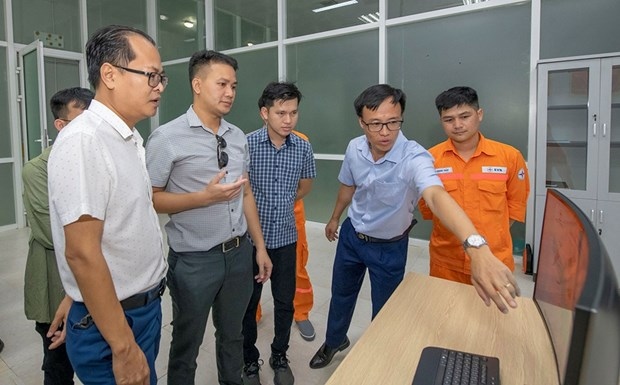 vietnamese, lao experts share experience in hydropower plant operation picture 1