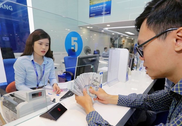 state bank adjusts usd vnd exchange rate band to 5 picture 1