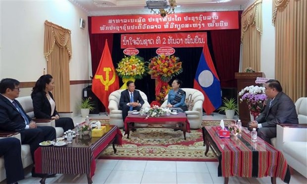 hcm city leader offers greetings on lao national day picture 1