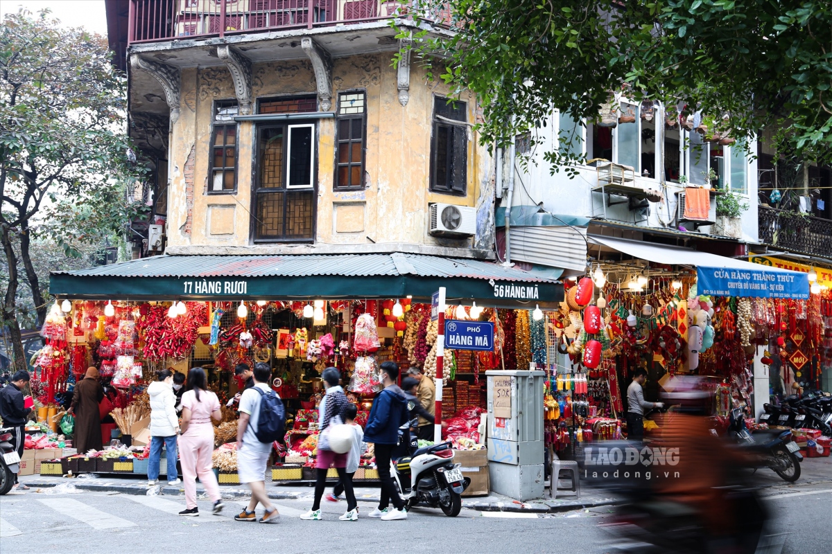 hang ma street decked out in red for tet celebrations after christmas picture 1