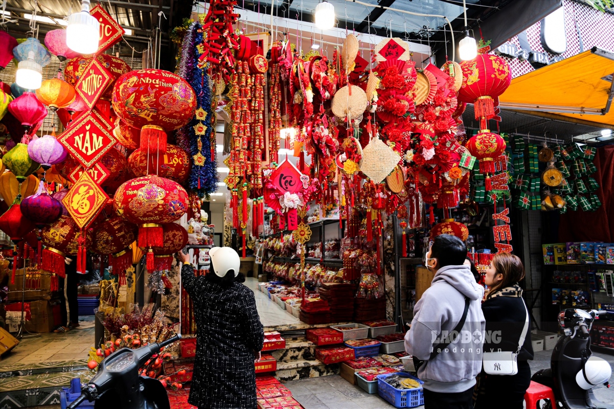 hang ma street decked out in red for tet celebrations after christmas picture 11