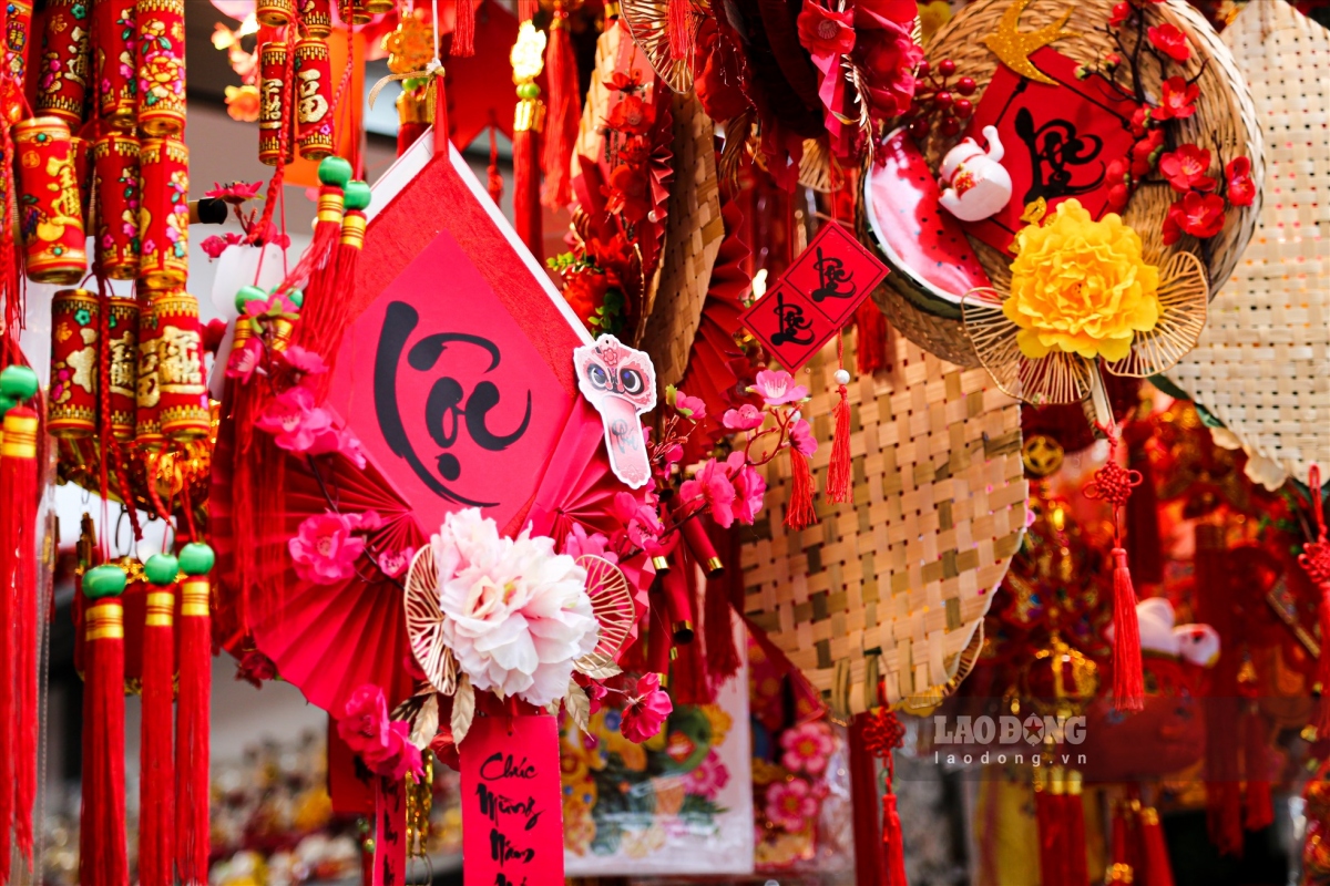 hang ma street decked out in red for tet celebrations after christmas picture 4