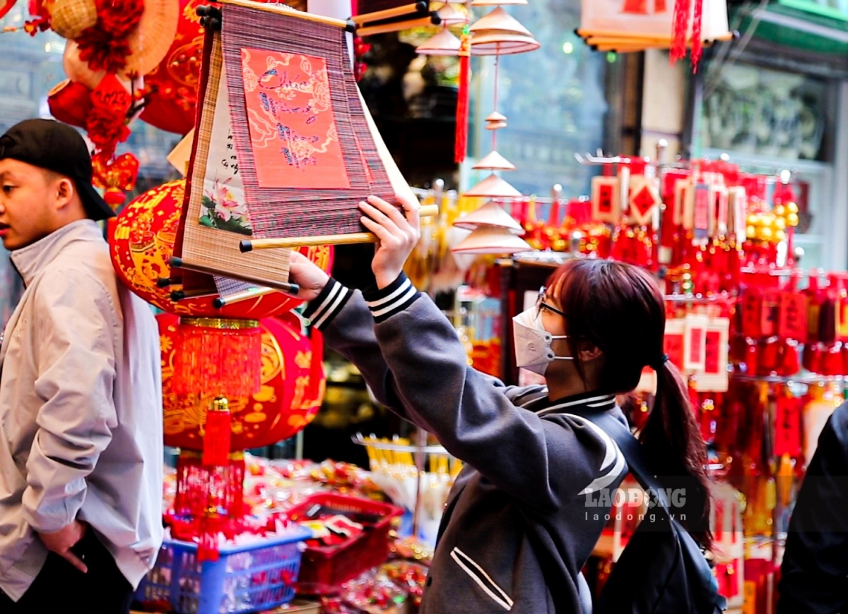 hang ma street decked out in red for tet celebrations after christmas picture 9