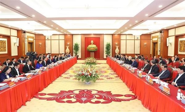 politburo members discuss review of resolution on hcm city development picture 1