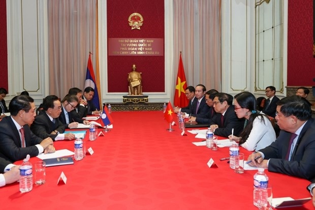 prime minister meets lao counterpart picture 1