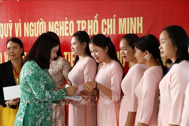 aid presented to teachers of lao-vietnamese bilingual school picture 1