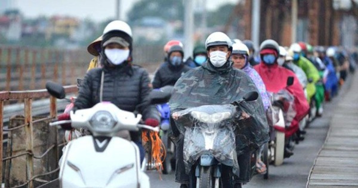 cold wave grips northern vietnam before drizzling rain falls picture 1