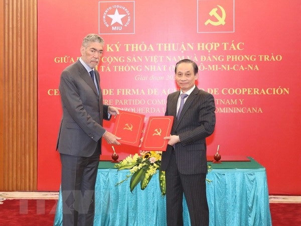 vietnam, dominican republic parties ink cooperation document picture 1