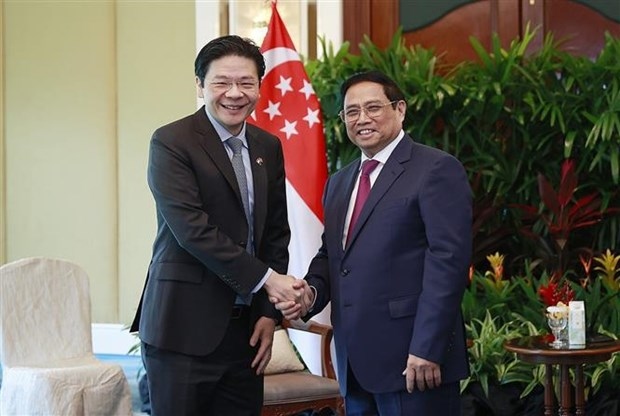 prime minister pham minh chinh meets with singaporean deputy pm picture 1