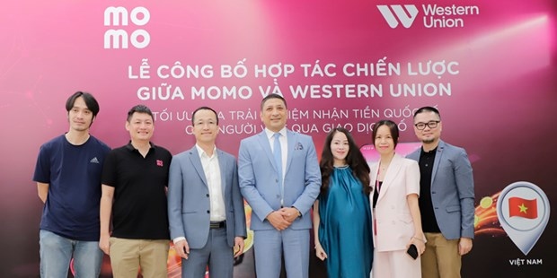 momo, western union partner for money transfer in vietnam picture 1