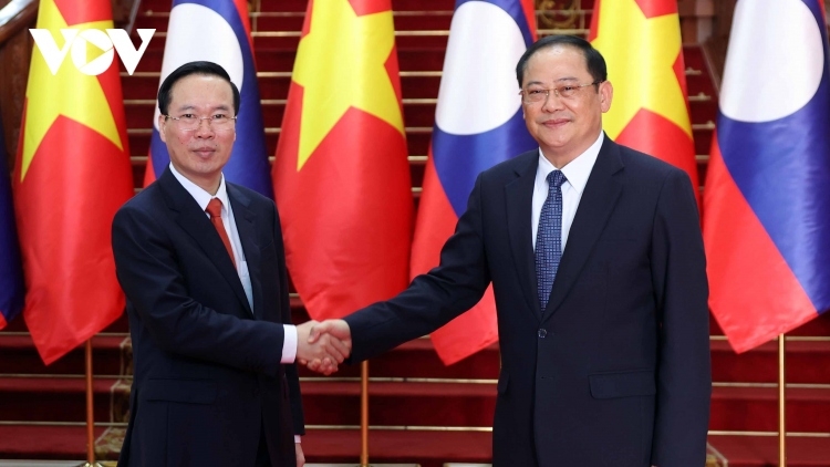 president thuong meets prime minister, top legislator of laos picture 1