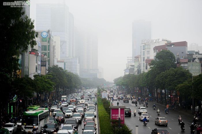 high-rise buildings hidden amid dense fog in hanoi picture 1
