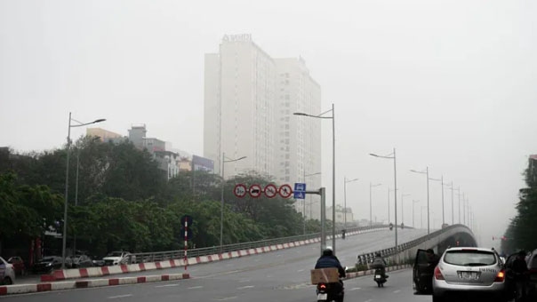 high-rise buildings hidden amid dense fog in hanoi picture 11