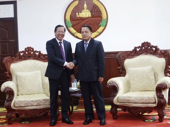 hcm city places top priority on cooperation with lao localities picture 1