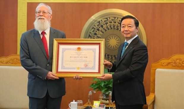 policy advisor awarded friendship medal for natural resources and environment efforts picture 1