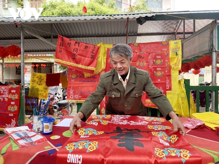 The banners are normally red, representing good luck. banner hanging of the tay, nung ethnic people picture 2